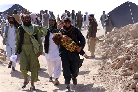 Desperate people dig out dead and injured from quakes that killed over 2,000 in Afghanistan.